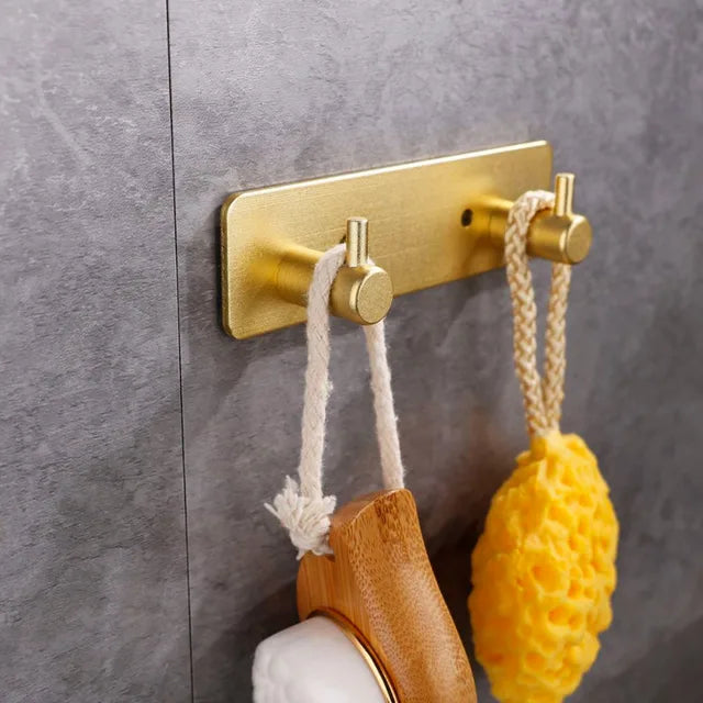 Tringle murale avec 2 crochet Dorée